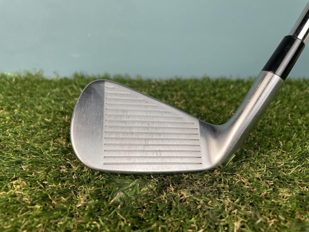 Close up of clean 7 iron after cleaning with Impact Detect Club Clean
