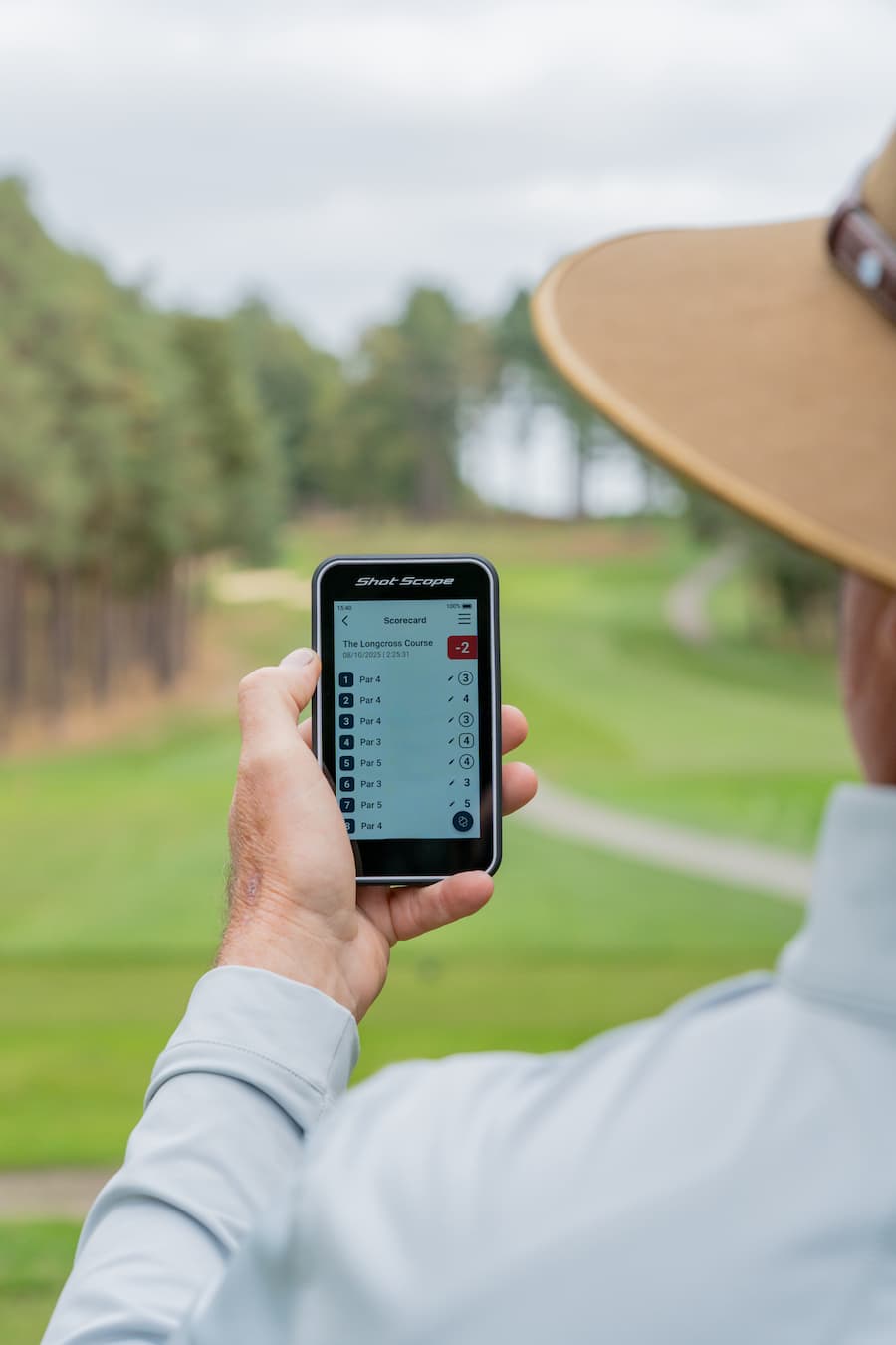 Shot Scope H50 Handheld on the golf course displaying the scorecard