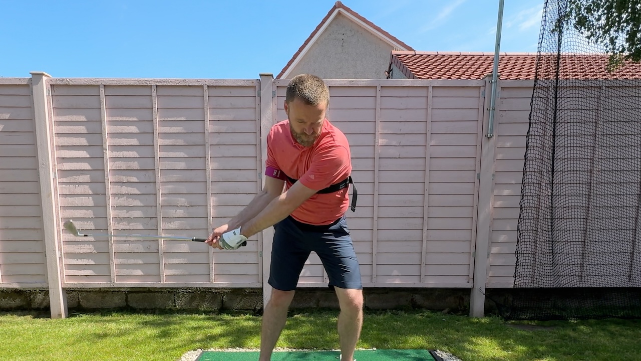 Connected takeaway in golf swing with TRS Slider