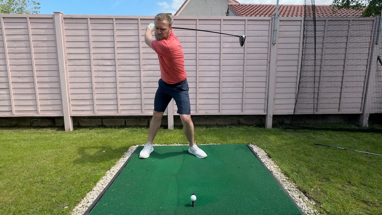 Andy long backswing with driver when not wearing the TRS Slider swing training aid.
