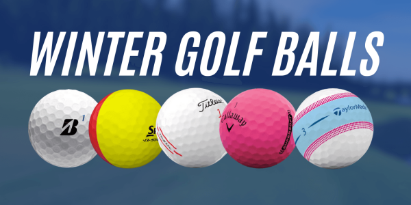 Several winter golf balls lined up