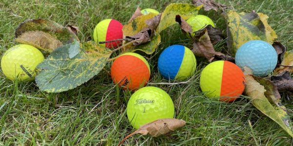 Winter golf balls on leaves